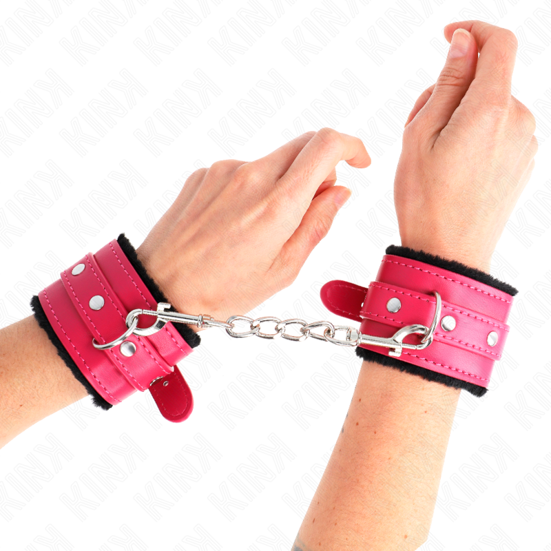 MUÑEQUERAS FORRADAS PREMIUM NEGRO CON CORREA FUCSIA AJUSTABLE 17-29 CM X 6 CM